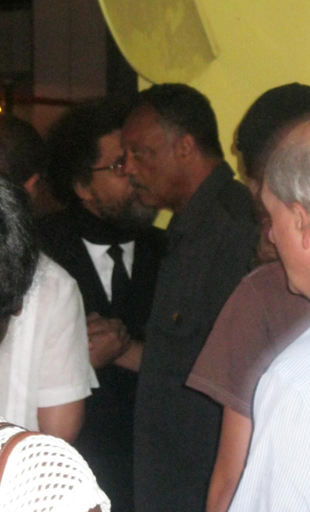 ALEX SUAREZ/STAFF Rev. Jackson and Dr.West shaking hands. 