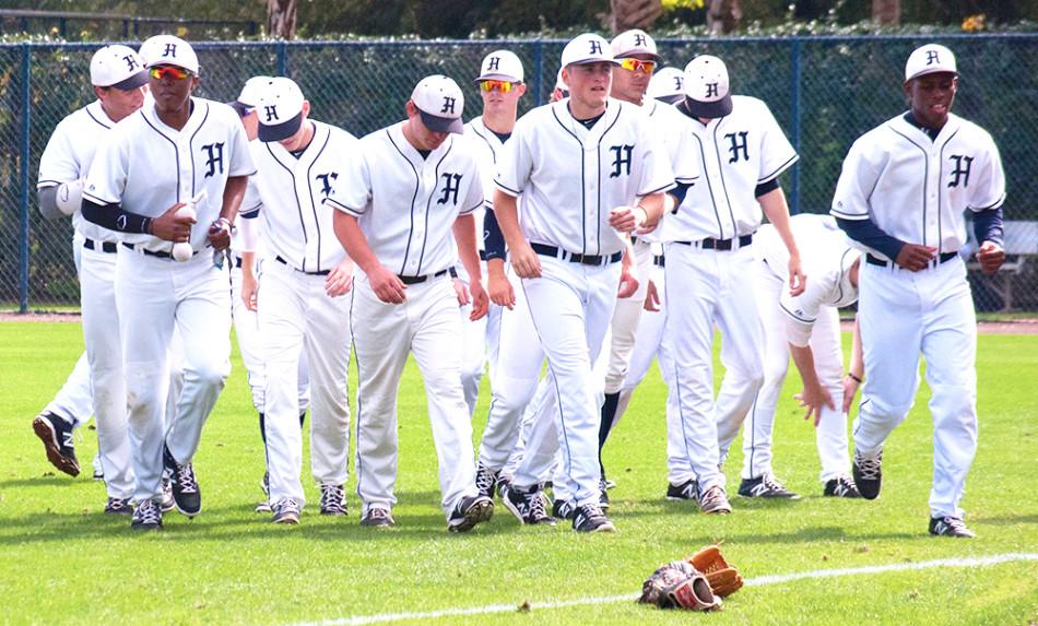 Preparing for the season opener after a team huddle.