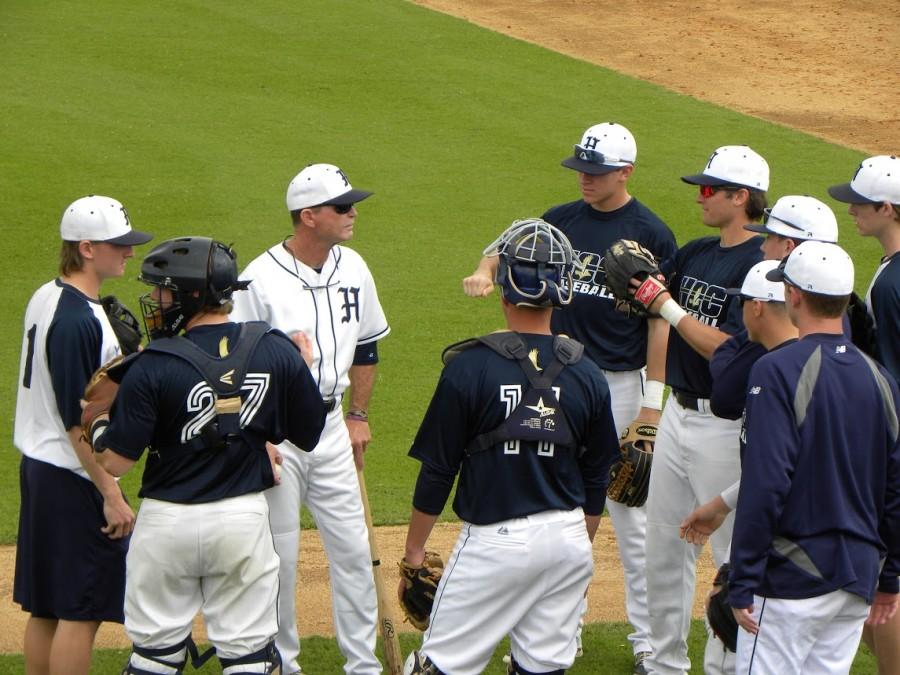 Coach Calhoun speaks with his players before the season opener.