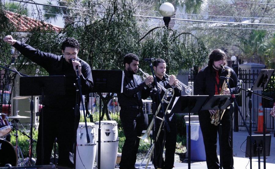 The HCC Ybor Music Club performs for students in the plaza.