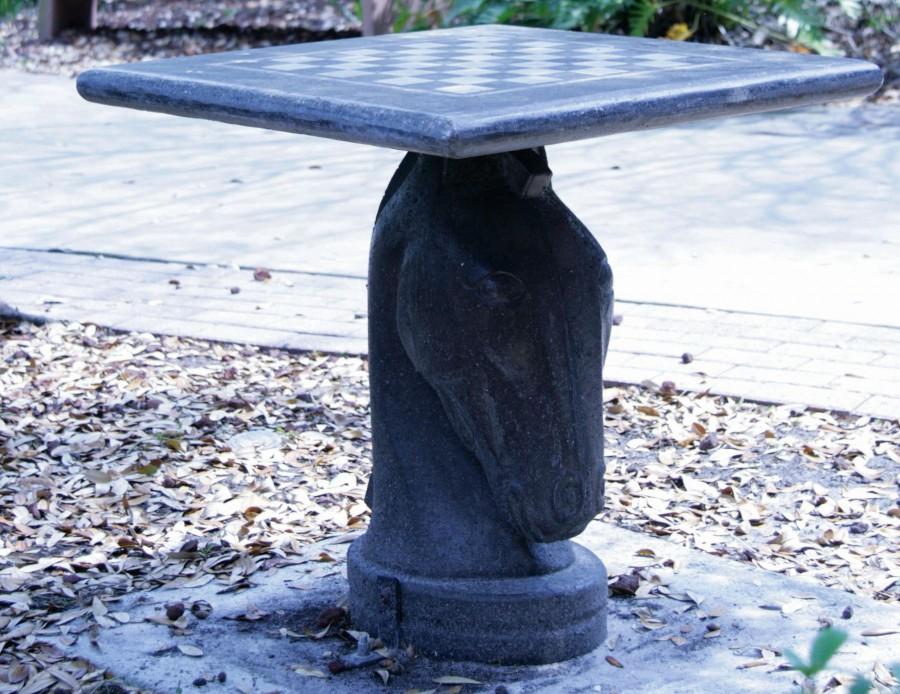 Chess Club matches can be enjoyed in the Ybor campus plaza.