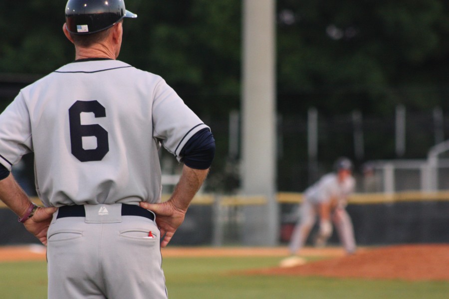 Coach Calhoun keeps an eye on the base path from behind third base. 