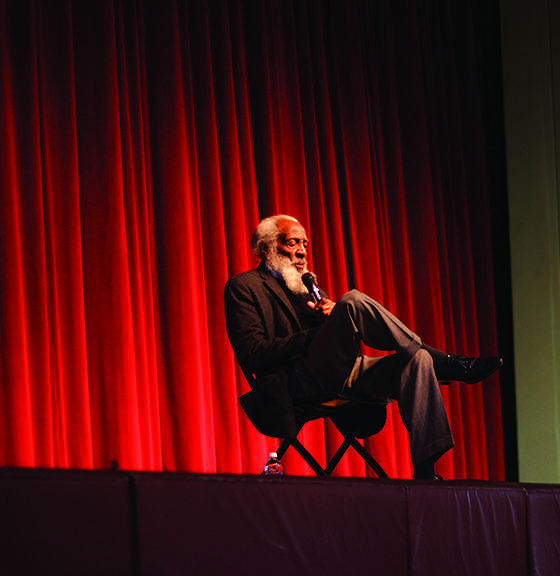 Gregory speaking about his life to young audience.