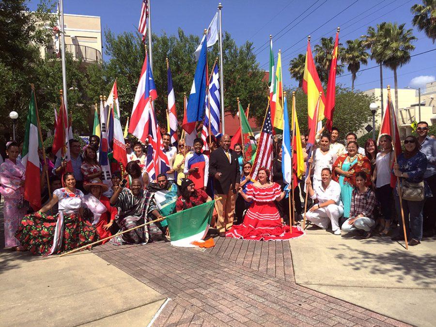 Student+representatives+involved+in+the+International+Student+Festival+gather+with+HCC+President%2C+Dr.+Atwater+in+the+plaza.