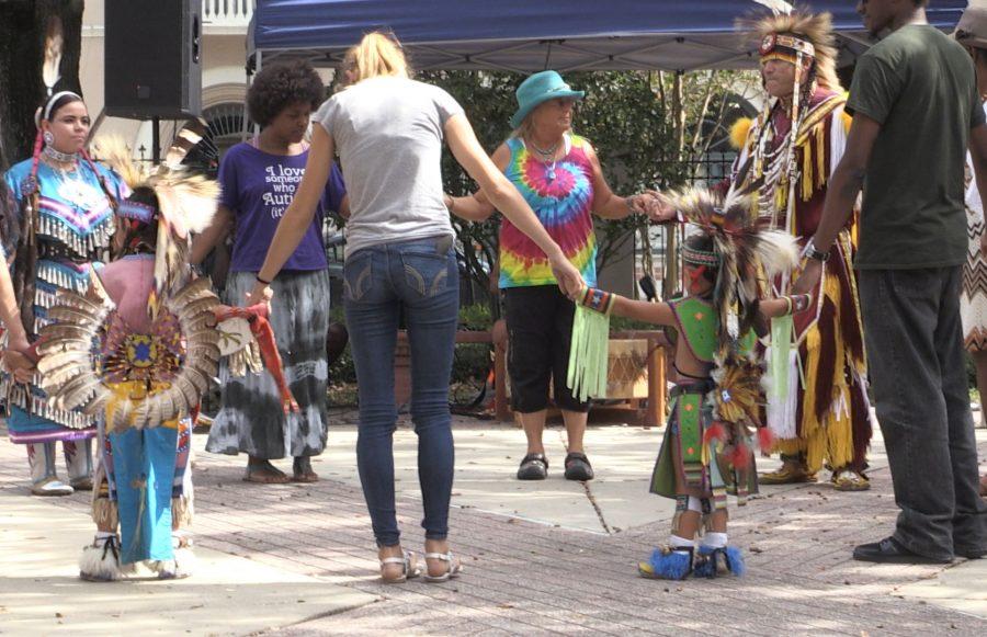 Children, family and friends all join in for a dance. The Ybor City campus SGA hosted the Pow Wow event.
