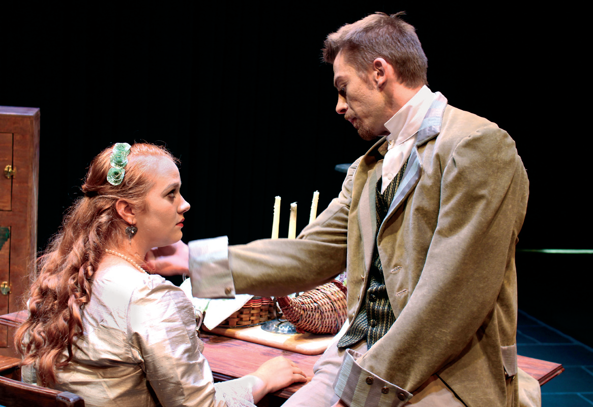Allison Bistany, as Miss Julie and Andrew Laughery, as Jean, discuss their relationship.