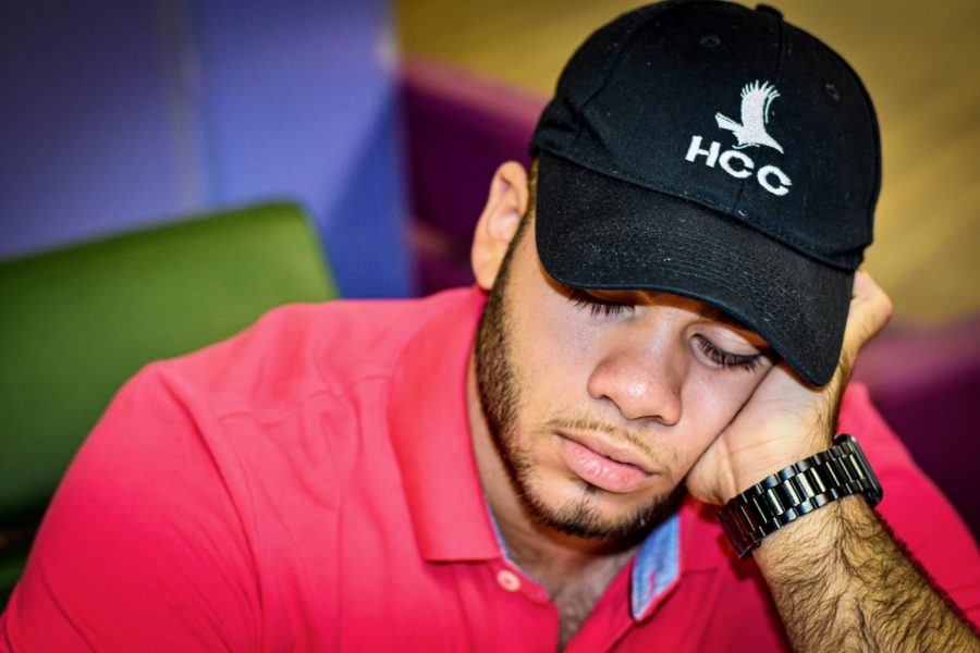 HCC student EliuDaniel Reyes sleeping in the student lounge before his 8 a.m. class.