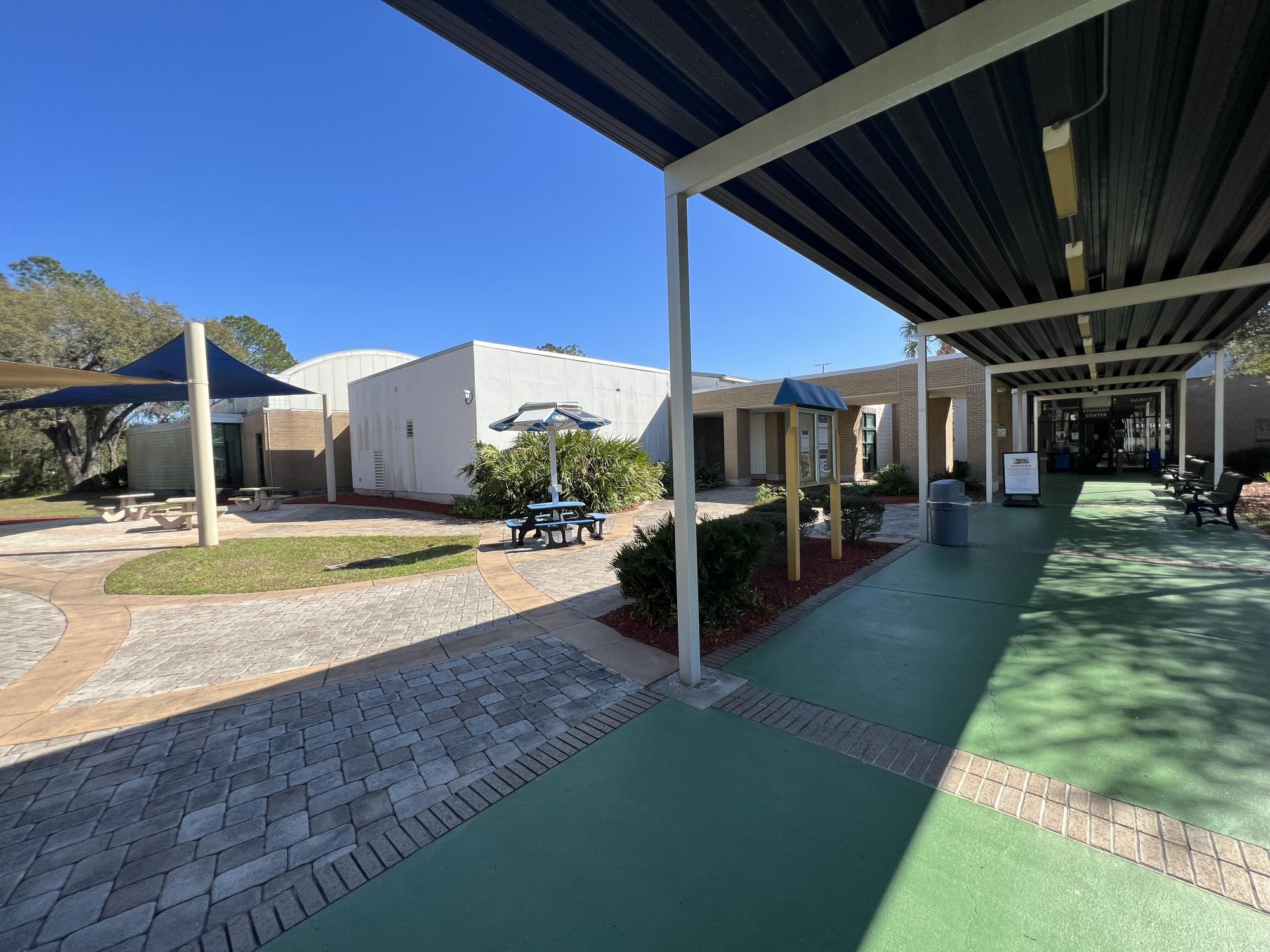 The student quad on the HCC Plant City campus sits empty
mid-day during the semester.